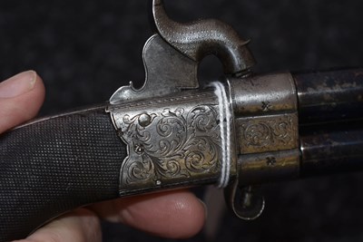 Lot 636 - A 56-BORE PERCUSSION TURNOVER POCKET PISTOL