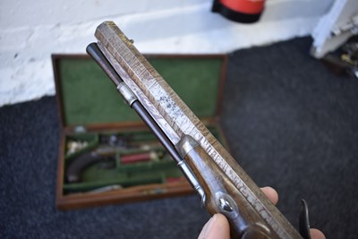 Lot 328 - A FINE QUALITY CASED PAIR OF 22-BORE GOLD INLAID FLINTLOCK DUELLING PISTOLS BY H.W. MORTIMER