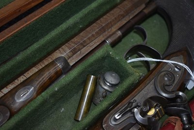 Lot 328 - A FINE QUALITY CASED PAIR OF 22-BORE GOLD INLAID FLINTLOCK DUELLING PISTOLS BY H.W. MORTIMER