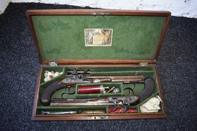 Lot 328 - A FINE QUALITY CASED PAIR OF 22-BORE GOLD INLAID FLINTLOCK DUELLING PISTOLS BY H.W. MORTIMER