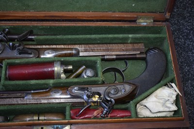 Lot 328 - A FINE QUALITY CASED PAIR OF 22-BORE GOLD INLAID FLINTLOCK DUELLING PISTOLS BY H.W. MORTIMER