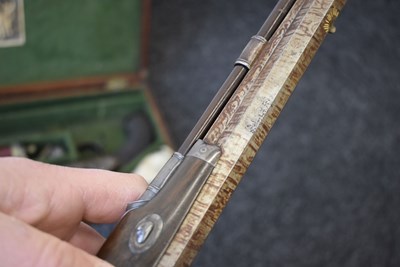 Lot 328 - A FINE QUALITY CASED PAIR OF 22-BORE GOLD INLAID FLINTLOCK DUELLING PISTOLS BY H.W. MORTIMER