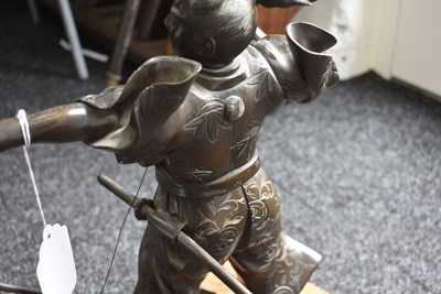 Lot 50 - A JAPANESE BRONZE FIGURE OF A WARRIOR ARCHER OR KYUDOKA