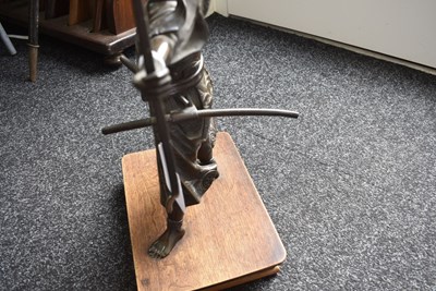 Lot 50 - A JAPANESE BRONZE FIGURE OF A WARRIOR ARCHER OR KYUDOKA