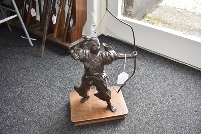 Lot 50 - A JAPANESE BRONZE FIGURE OF A WARRIOR ARCHER OR KYUDOKA