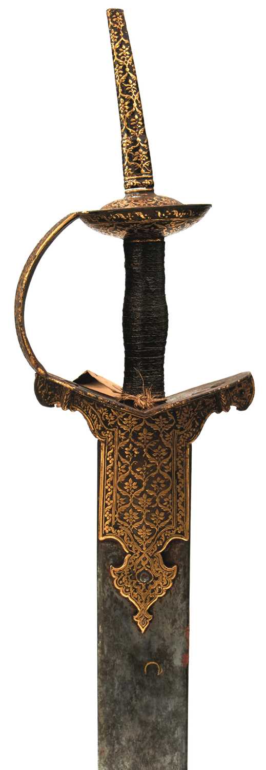 Lot 58 - OF TIPU SULTAN INTEREST - AN IMPORTANT 18TH CENTURY INDIAN FIRANGI OR KHANDA WITH SUSPENSION BELT ENSEMBLE FROM SERINGAPATAM
