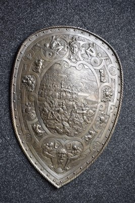 Lot 273 - A 19TH CENTURY BRONZED CAST PARADE SHIELD