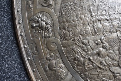 Lot 273 - A 19TH CENTURY BRONZED CAST PARADE SHIELD