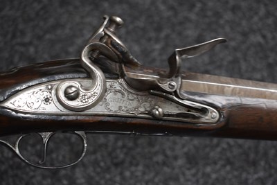 Lot 375 - A SCARCE 12-BORE SILVER MOUNTED FULL STOCKED FLINTLOCK SPORTING GUN BY GRIFFIN