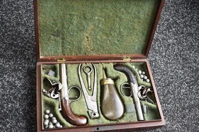 Lot 311 - A SCARCE CASED PAIR OF 77-BORE FLINTLOCK MUFF PISTOLS BY W. BOND