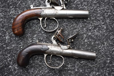 Lot 311 - A SCARCE CASED PAIR OF 77-BORE FLINTLOCK MUFF PISTOLS BY W. BOND