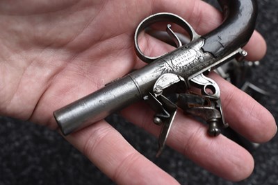 Lot 311 - A SCARCE CASED PAIR OF 77-BORE FLINTLOCK MUFF PISTOLS BY W. BOND